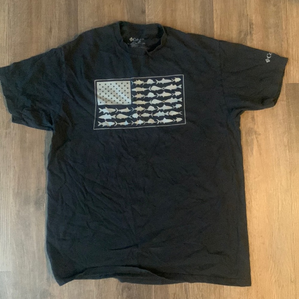 Columbia black t shirt imprint on front. Gently worn